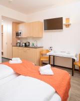 Posteľ alebo postele v izbe v ubytovaní Apartments Favoriten