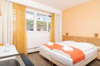 Posteľ alebo postele v izbe v ubytovaní Apartments Favoriten