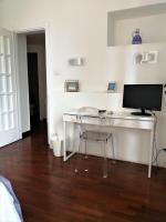A television and/or entertainment centre at EMI's Guest House