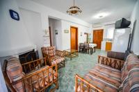 Televízia a/alebo spoločenská miestnosť v ubytovaní Apartman Porto Blue Lux