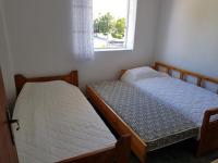 Posteľ alebo postele v izbe v ubytovaní Apartman Porto Blue Lux