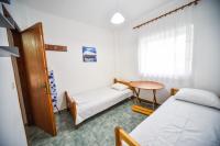 Posteľ alebo postele v izbe v ubytovaní Apartman Porto Blue Lux