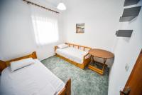 Posteľ alebo postele v izbe v ubytovaní Apartman Porto Blue Lux