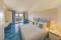 Posteľ alebo postele v izbe v ubytovaní Hotel Santa Gilla