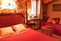 Postel nebo postele na pokoji v ubytování Casa Rural La Lastría