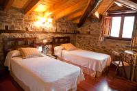 Postel nebo postele na pokoji v ubytování Casa Rural La Lastría