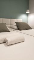 Posteľ alebo postele v izbe v ubytovaní Fiorino Rooms Korčula