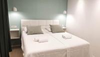 Posteľ alebo postele v izbe v ubytovaní Fiorino Rooms Korčula