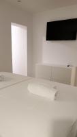 Posteľ alebo postele v izbe v ubytovaní Fiorino Rooms Korčula