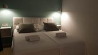 Posteľ alebo postele v izbe v ubytovaní Fiorino Rooms Korčula