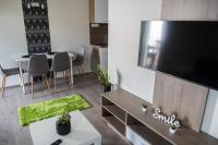 Telewizja i/lub zestaw kina domowego w obiekcie Tempó Apartman Siófok