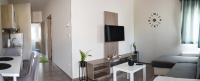 Telewizja i/lub zestaw kina domowego w obiekcie Tempó Apartman Siófok