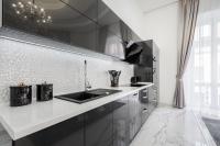 A kitchen or kitchenette at Király 35 Luxury Apartment with free parking