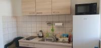 Kuchyňa alebo kuchynka v ubytovaní Apartmani Sonia
