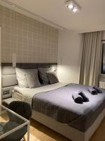 Posteľ alebo postele v izbe v ubytovaní Apartament Opieszyn 16