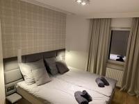 Posteľ alebo postele v izbe v ubytovaní Apartament Opieszyn 16