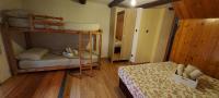 A bed or beds in a room at Casa Enea