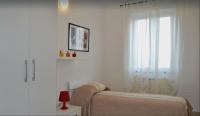 A bed or beds in a room at Casa di Gian