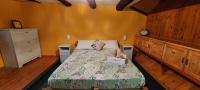 A bed or beds in a room at Casa Enea