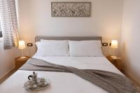 A bed or beds in a room at TERRA TERRA - Masseria Minunni