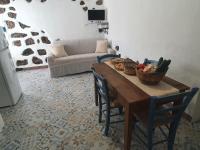 A seating area at Casa Vacanza Sa Prenda