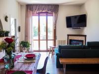 TV a/nebo společenská místnost v ubytování Appartamento nel cuore dell'Appennino Tosco-Emiliano