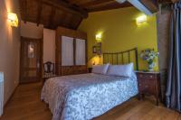 Posteľ alebo postele v izbe v ubytovaní Casa Perfeuto Maria