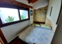 A bed or beds in a room at IL SANTO GRAAL