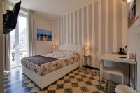 A bed or beds in a room at Amar