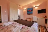 A bed or beds in a room at Amar