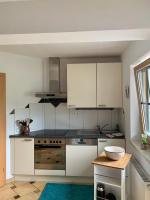 A kitchen or kitchenette at Apart Haus Bella