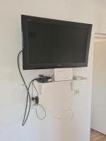 TV a/nebo společenská místnost v ubytování Apartmani Dejan