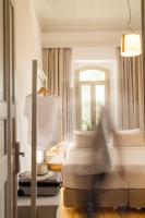 Postel nebo postele na pokoji v ubytování Eressian Hotel & Hammam Spa