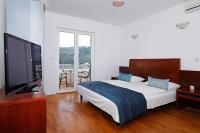 Llit o llits en una habitaci&oacute; de Apartments Vala