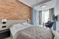 Posteľ alebo postele v izbe v ubytovaní Comfort Apartments Granaria