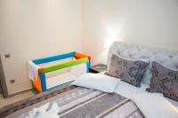 Postel nebo postele na pokoji v ubytování Glyfada Beach Hotel