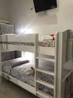 Posteľ alebo postele v izbe v ubytovaní Marzia Etna apartment