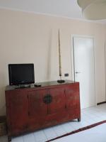 Televízia a/alebo spoločenská miestnosť v ubytovaní Residenze Torinesi