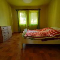 Łóżko lub łóżka w pokoju w obiekcie Tulman Villa