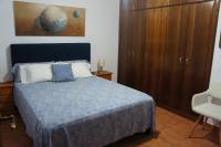 Postel nebo postele na pokoji v ubytování Casa Rural La Candelaria