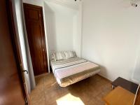 Postel nebo postele na pokoji v ubytování Apartamento Hostal Mellizo