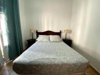 Postel nebo postele na pokoji v ubytování Apartamento Hostal Mellizo