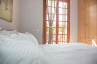 A bed or beds in a room at River