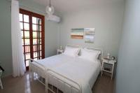 A bed or beds in a room at River