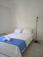 Posteľ alebo postele v izbe v ubytovaní Kavala Home 2
