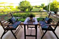 A balcony or terrace at Maria's house apartment in skala Fourkas
