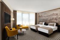 Posteľ alebo postele v izbe v ubytovaní Grand Hotel Esztergom