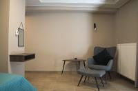 Posedenie v ubytovaní Elaėa Boutique Apartments