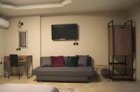 Posedenie v ubytovaní Elaėa Boutique Apartments