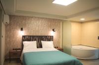 Posteľ alebo postele v izbe v ubytovaní Elaėa Boutique Apartments